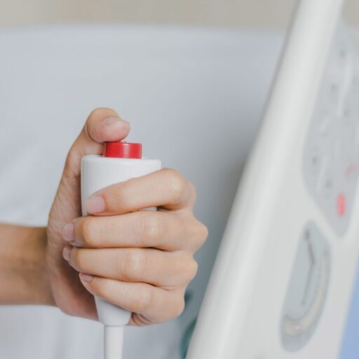 patient hand pressing Medical Device Alarm